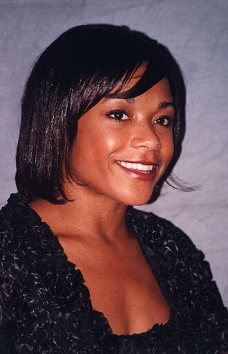 Dominique Dawes height profile photo