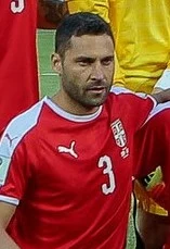 Duško Tošić height profile photo