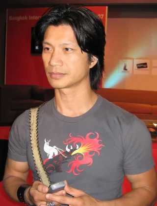 Dustin Nguyen height profile photo