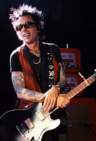 Earl Slick height profile photo