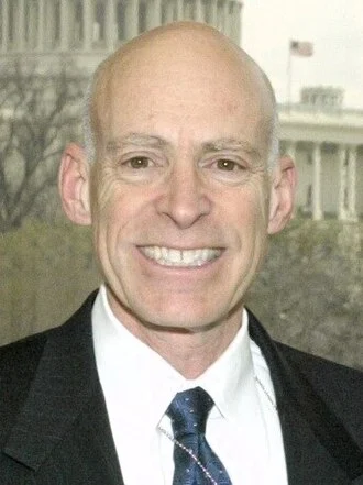 Edward Lazear height profile photo
