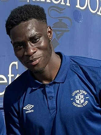 Elijah Adebayo height profile photo
