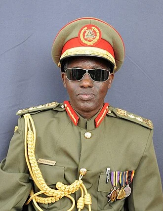 Elly Tumwine height profile photo