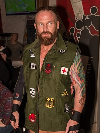 Eric Young (wrestler) height profile photo