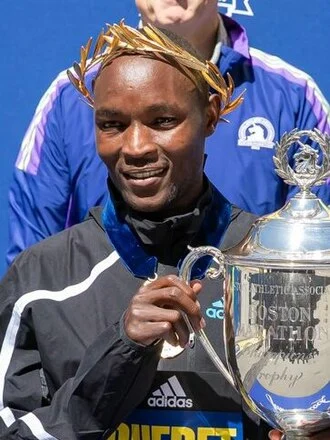Evans Chebet height profile photo
