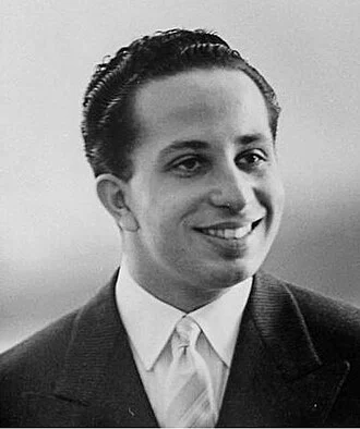 Faisal II height profile photo