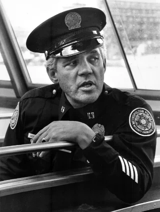 G. W. Bailey height profile photo