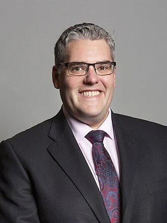Gavin Robinson height profile photo