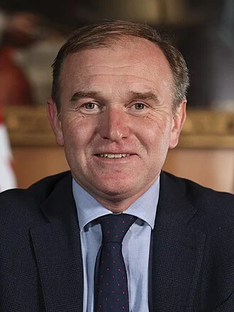 George Eustice height profile photo