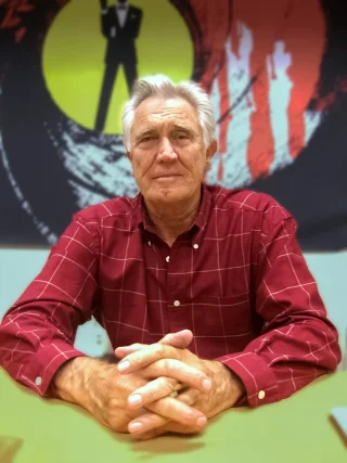 George Lazenby height profile photo