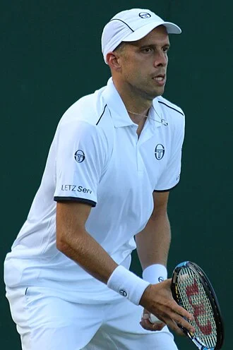 Gilles Müller height profile photo