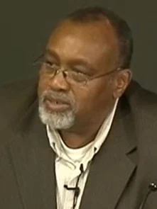 Glenn Loury height profile photo