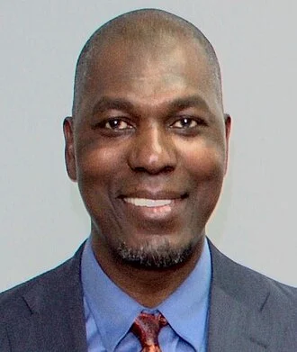Hakeem Olajuwon height profile photo