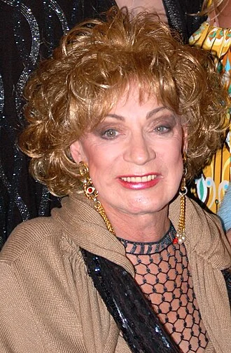 Holly Woodlawn height profile photo