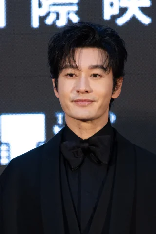 Huang Xiaoming height profile photo