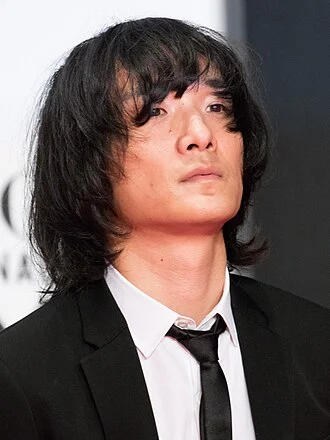 Huwie Ishizaki height profile photo