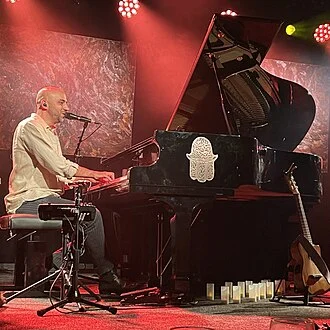 Idan Raichel height profile photo