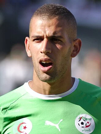Islam Slimani height profile photo
