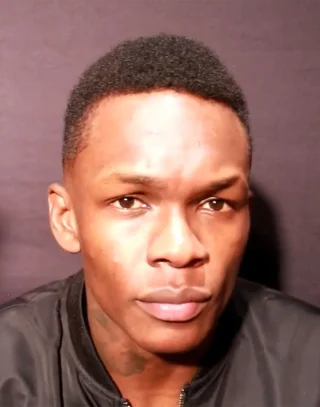 Israel Adesanya height profile photo