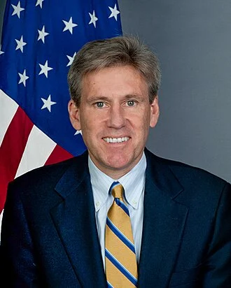 J. Christopher Stevens height profile photo