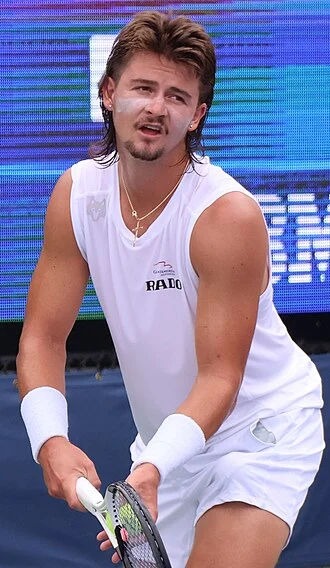 J. J. Wolf height profile photo