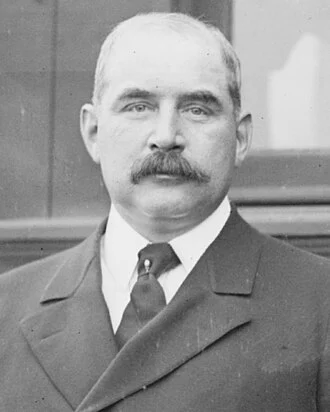 J. P. Morgan Jr. height profile photo