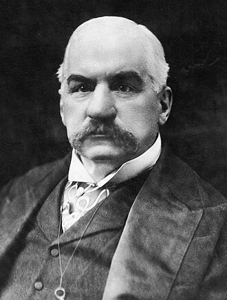 J. P. Morgan height profile photo