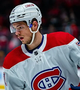Jake Evans (ice hockey) height profile photo