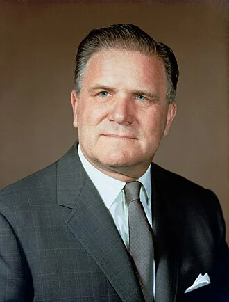 James E. Webb height profile photo