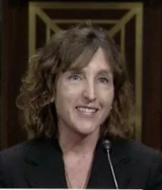 Jane L. Kelly height profile photo