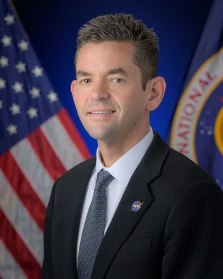 Jared Isaacman height profile photo