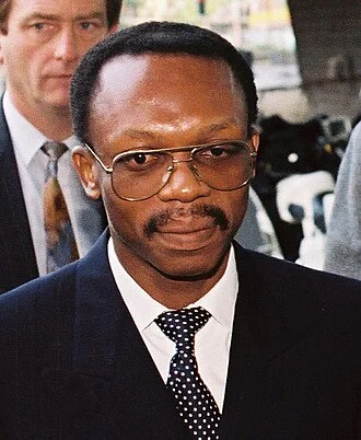 Jean-Bertrand Aristide height profile photo