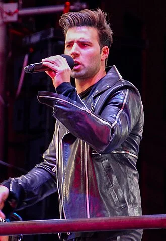 Jencarlos Canela height profile photo