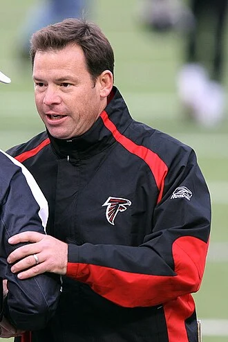 Jim L. Mora height profile photo