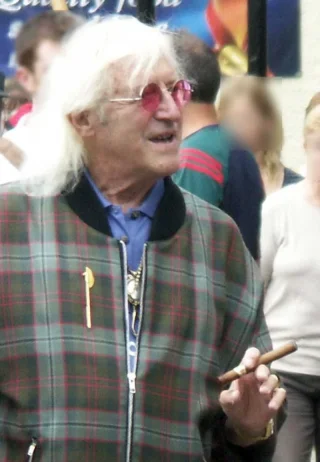 Jimmy Savile height profile photo