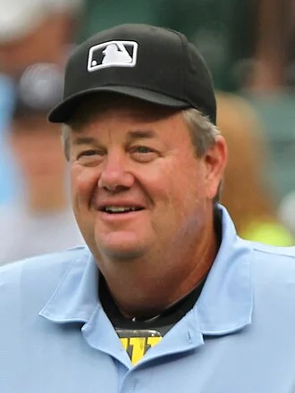 Joe West (umpire) height profile photo