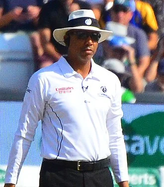 Joel Wilson (umpire) height profile photo