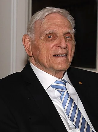 John B. Goodenough height profile photo