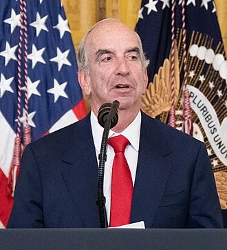 John B. Hess height profile photo