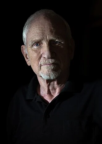 John Clauser height profile photo