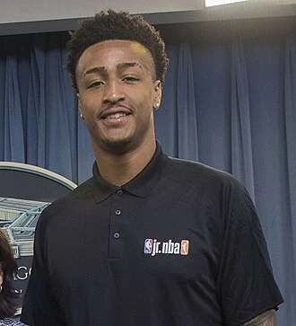 John Collins (basketball) height profile photo