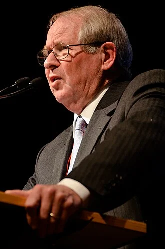 John Dugard height profile photo