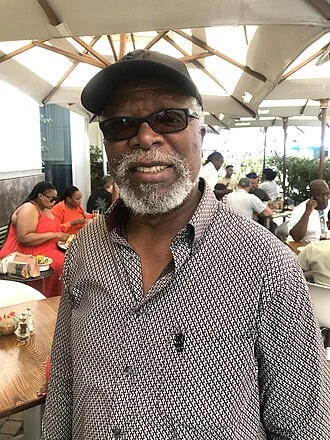 John Kani height profile photo