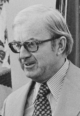 John McLaughlin (host) height profile photo