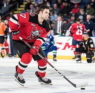 John Quenneville height profile photo