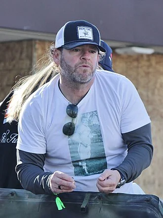 John Schneider (American football executive) height profile photo