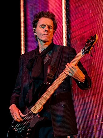 John Taylor (bass guitarist) height profile photo