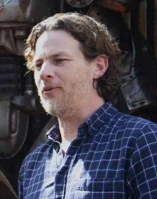 Jonathan Nolan height profile photo