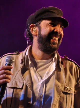 Juan Luis Guerra height profile photo