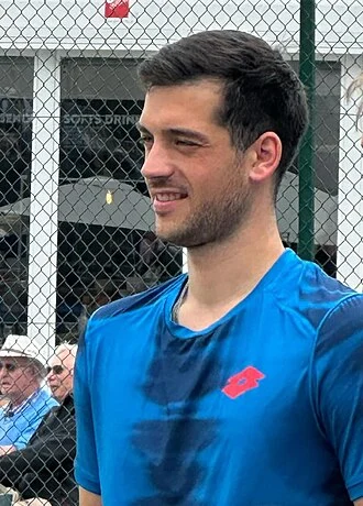 Julian Cash height profile photo